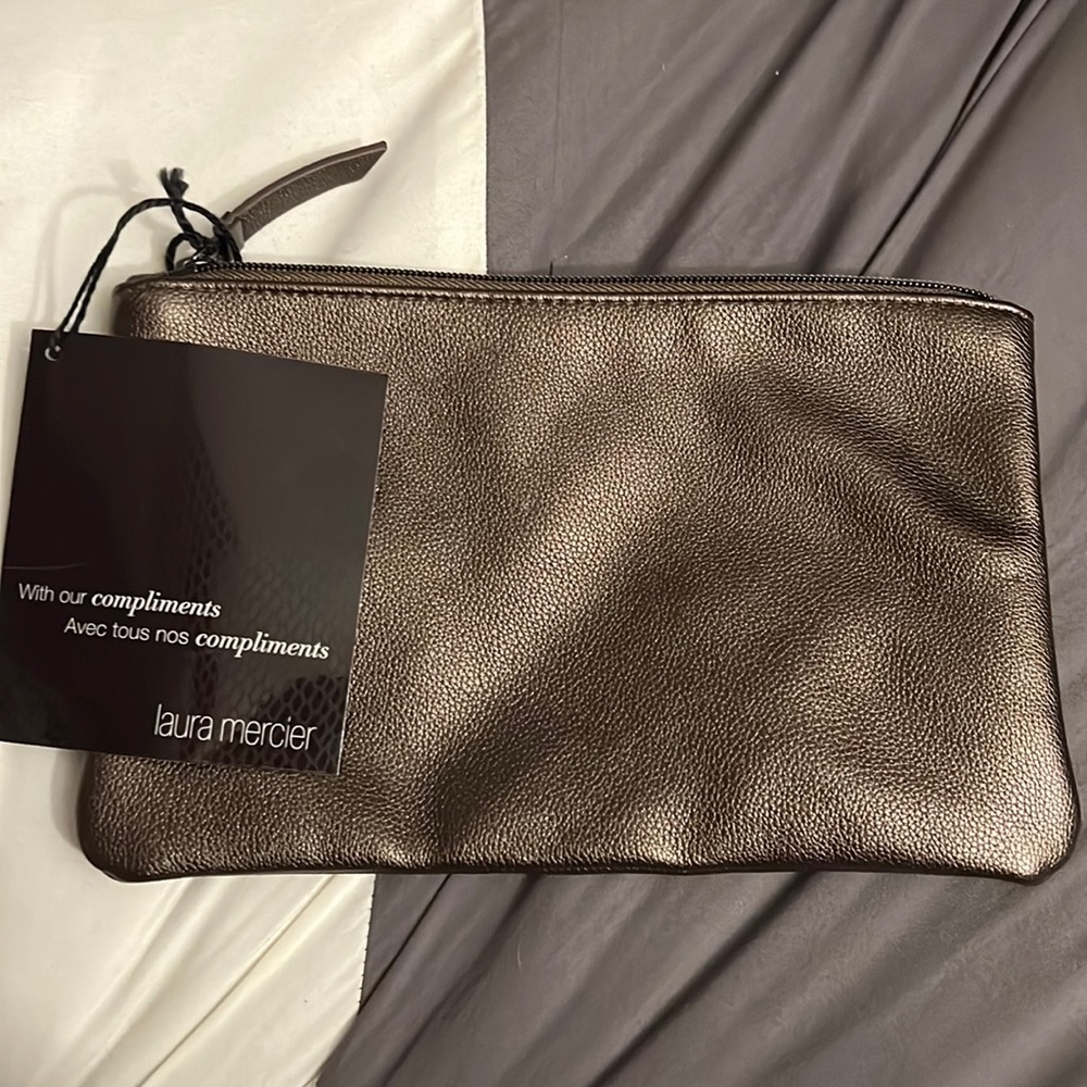 Laura Mercier, makeup bag
